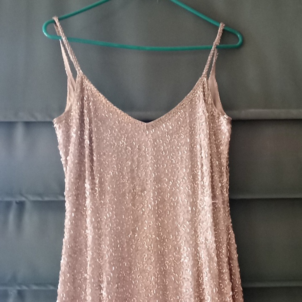 Georgous floor length entirely beaded silver gown... slight stained armpits...